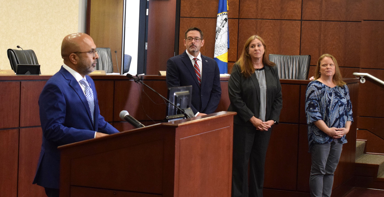 NC HHS Secretary Devdutta Sangvai speaks at a news confrence